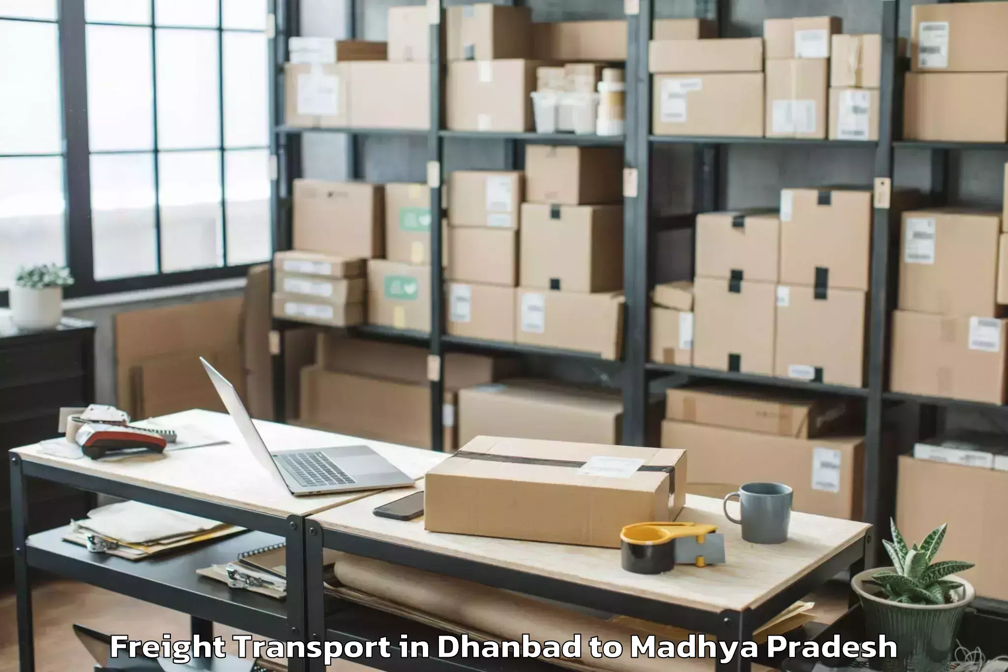 Book Your Dhanbad to Manpur Freight Transport Today